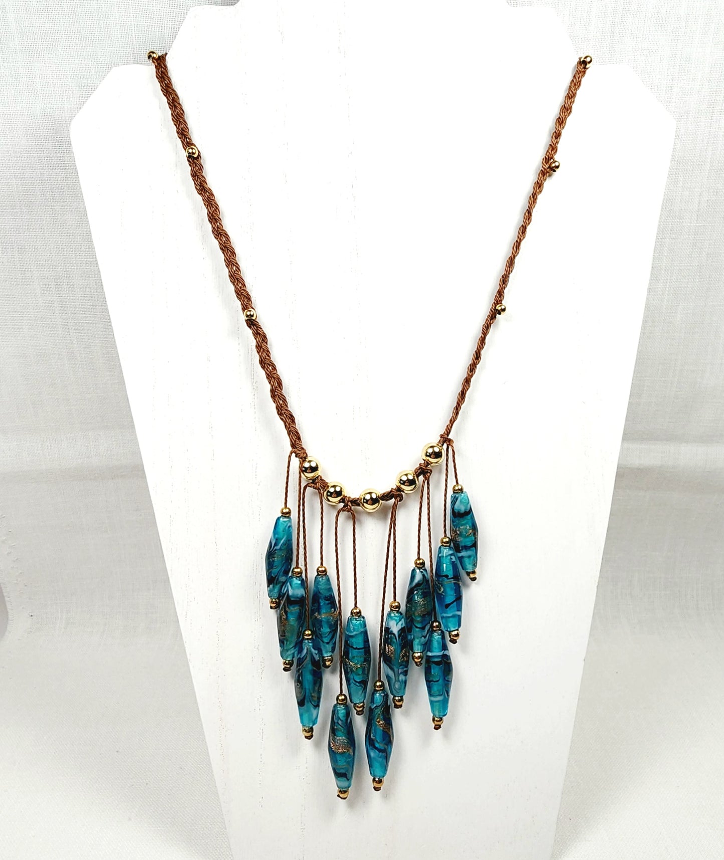 Teal Glass Boho Necklace – Handmade Jewelry with Rhombus Lampwork Beads, Golden Accents & Adjustable Braided Brown Cotton Cord