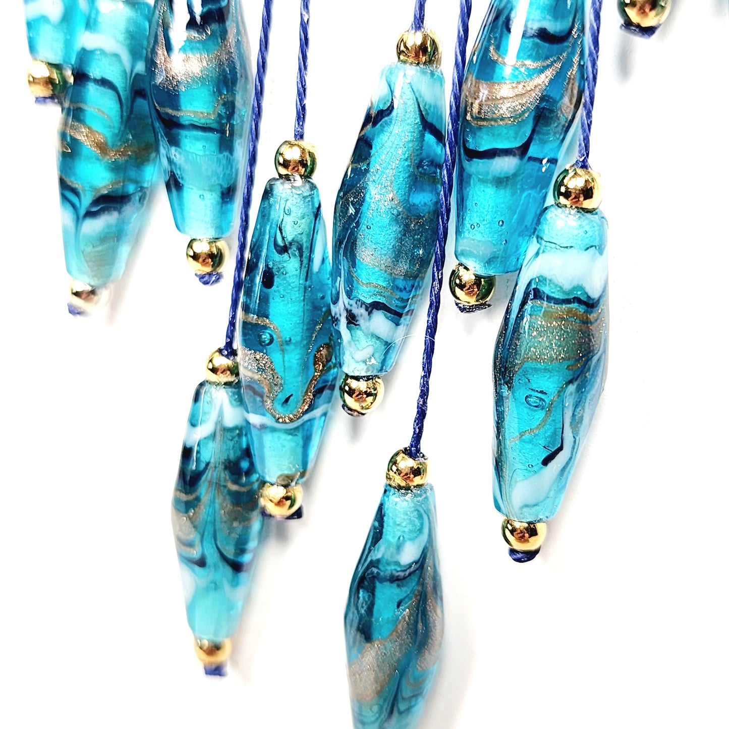 Teal Lampwork Glass Necklace – Handmade Boho Jewelry with Rhombus Beads, Golden Accents & Adjustable Blue Cotton Cord