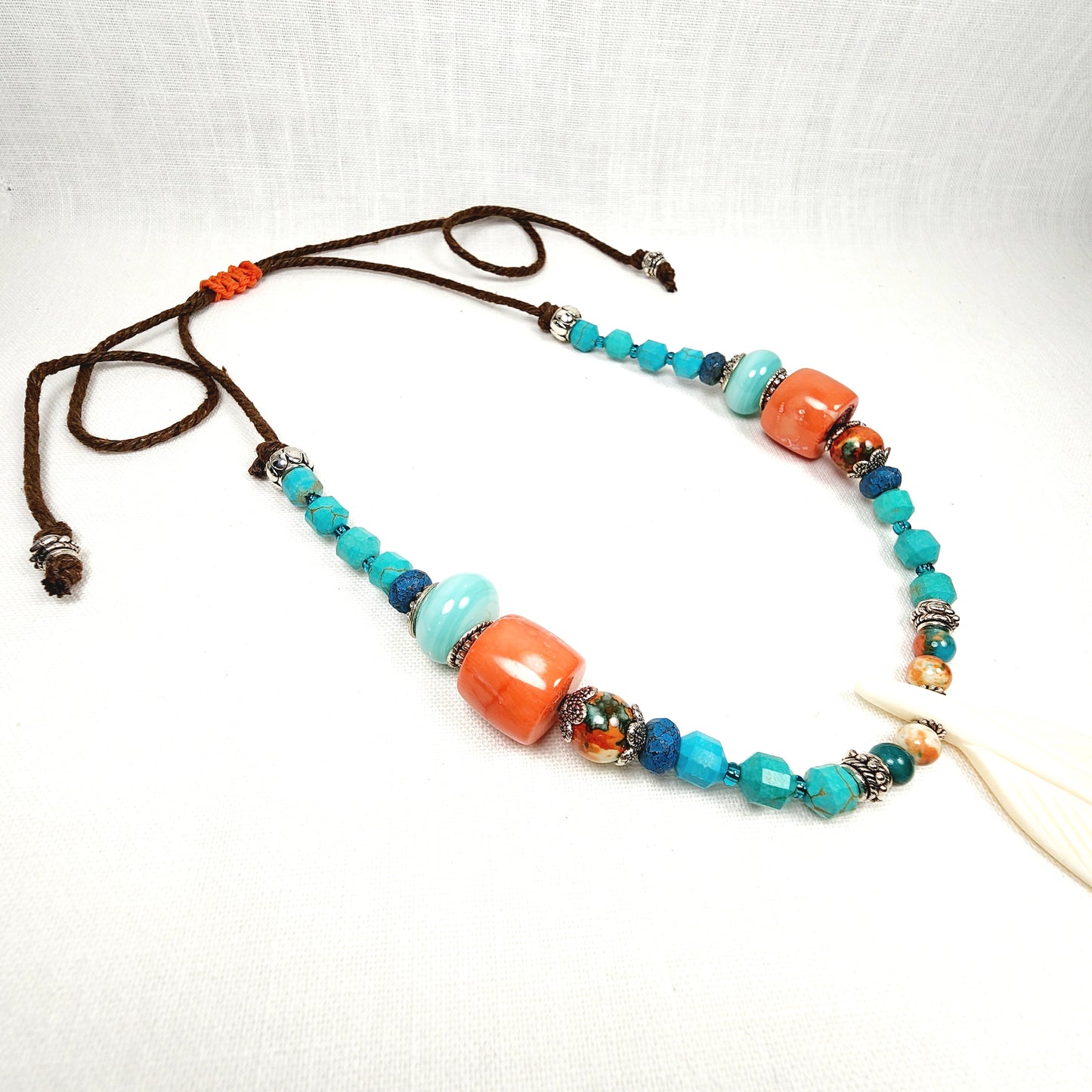 Boho Feather Necklace – Handmade Jewelry with White Resin Feather, Ocean Jade, Lampwork, Turquoise & Spiny Oyster Shell on Adjustable Brown Cord