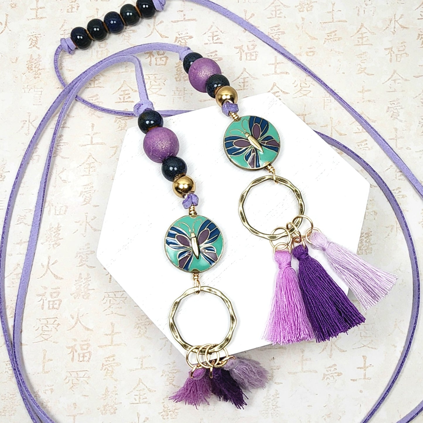Boho Butterfly Necklace – Handmade Jewelry with Brass Coin Beads, Purple Wood, Blue Ceramic & Tassels on Long Faux Suede Cord