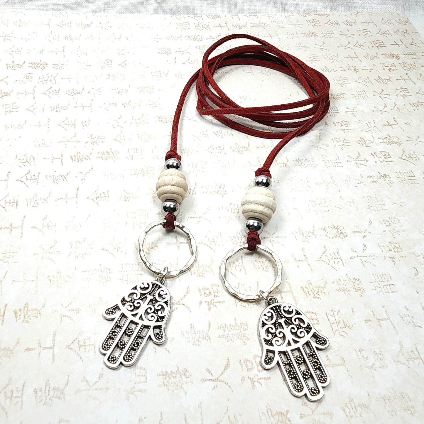 Boho Hamsa Hand Necklace – Handmade Jewelry with Silver Hamsa Charm, Wood Beads, Brass Rings & Faux Suede Brown Cord