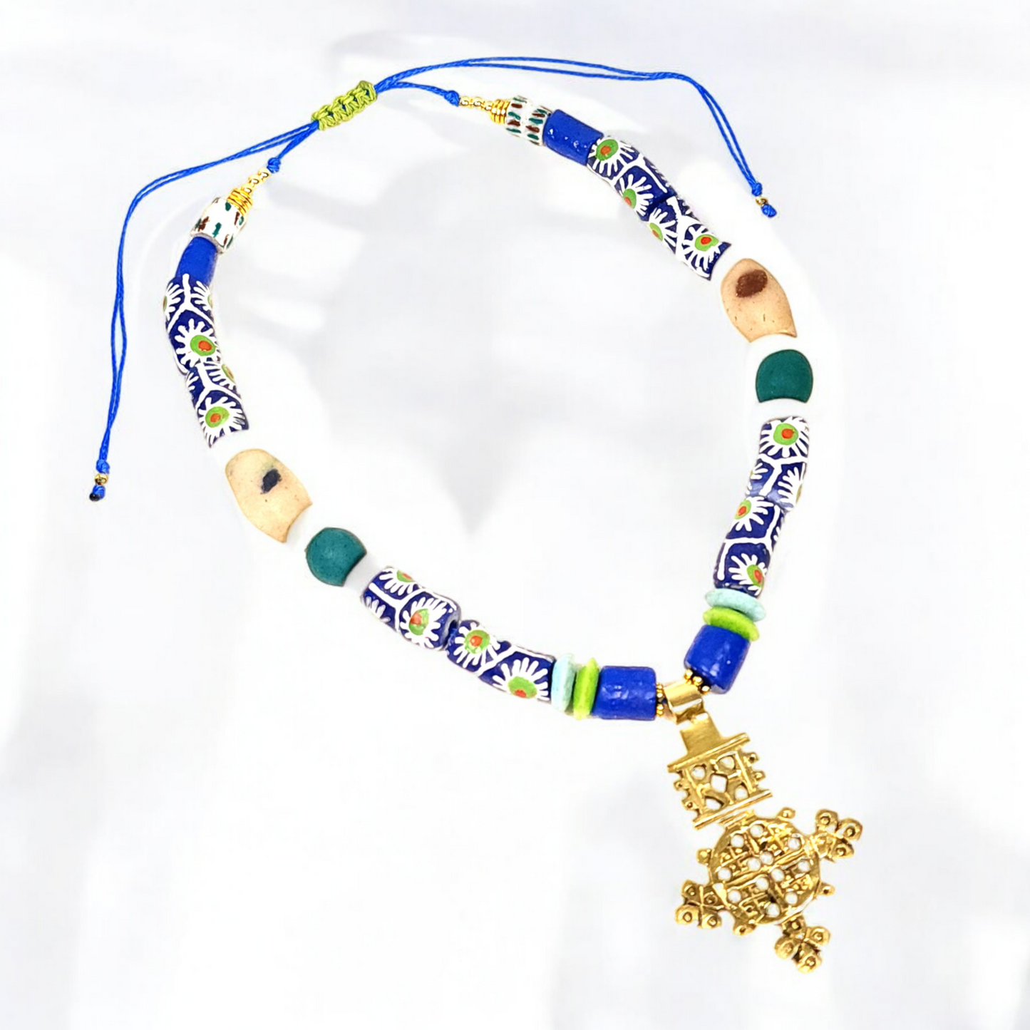 Ethiopian Brass Cross Necklace – Handmade African Tribal Jewelry with Krobo Beads, Ashanti Glass, Sandcast Accents & Adjustable Cord