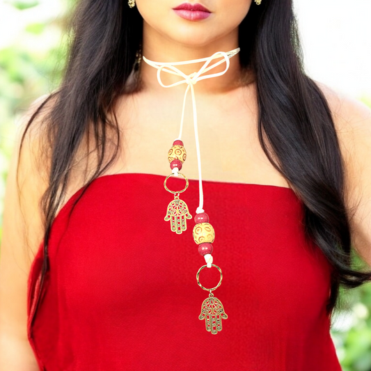 Boho Hamsa Hand Necklace – Handmade Jewelry with Brass Hamsa Charm, Red & Beige Wood Beads, Brass Rings & White Faux Suede Cord