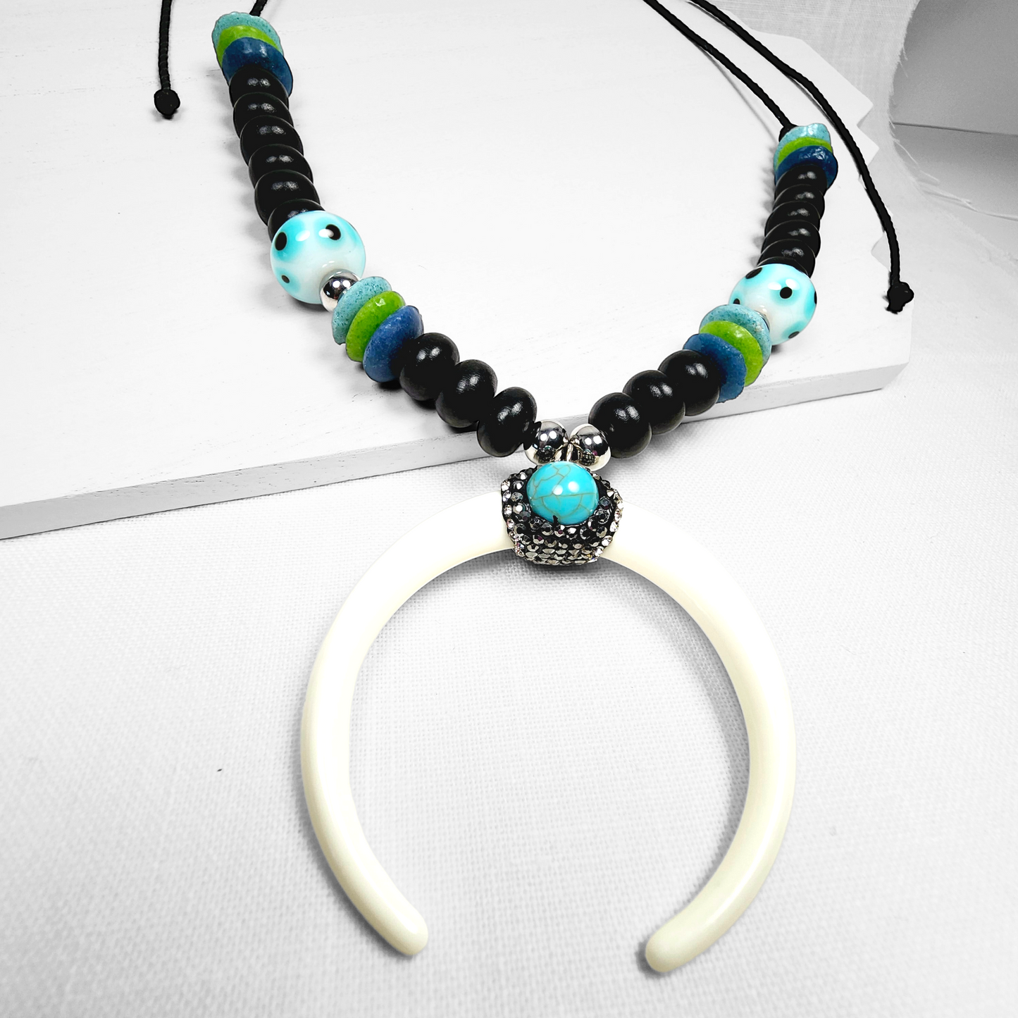 Boho Crescent Horn Moon Necklace – Handmade Jewelry with Ashanti Glass, Lampwork & Wool Beads on Black Cotton Cord