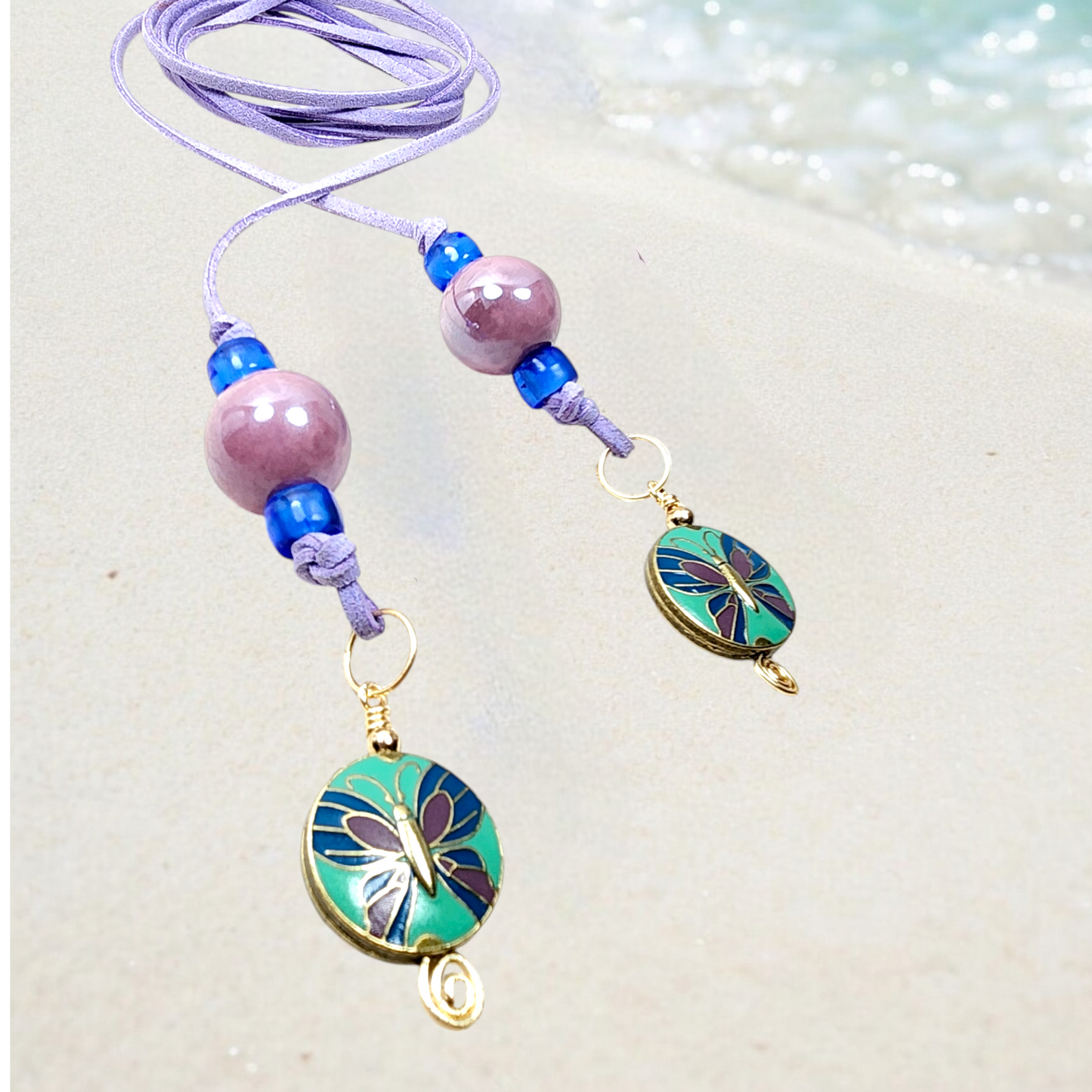 Boho Butterfly Necklace – Handmade Jewelry with Brass Butterfly Beads, Purple Ceramic, Blue Glass & Faux Suede Purple Cord