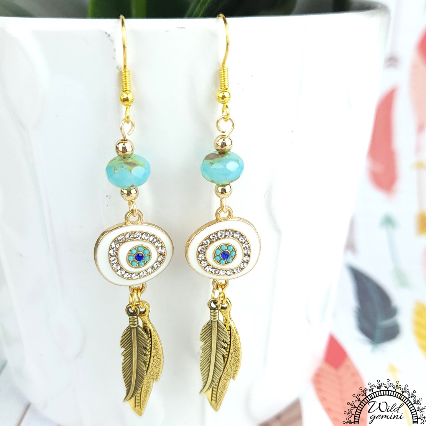 Boho Evil Eye Earrings – Handmade Gold Dangles with Teal Faceted Beads, Rhinestone Charms & Layered Feather Drops, 3.25” Long