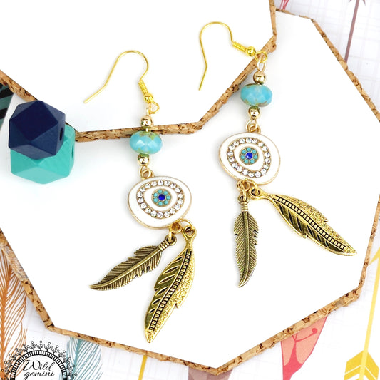 Boho Evil Eye Earrings – Handmade Gold Dangles with Teal Faceted Beads, Rhinestone Charms & Layered Feather Drops, 3.25” Long