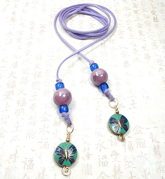 Boho Butterfly Necklace – Handmade Jewelry with Brass Butterfly Beads, Purple Ceramic, Blue Glass & Faux Suede Purple Cord
