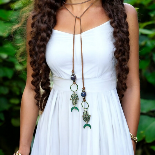Boho Hamsa & Moon Necklace – Handmade Jewelry with Silver Hamsa Charm, Blue Ceramic Beads, Brass Rings & Faux Suede Brown Cord