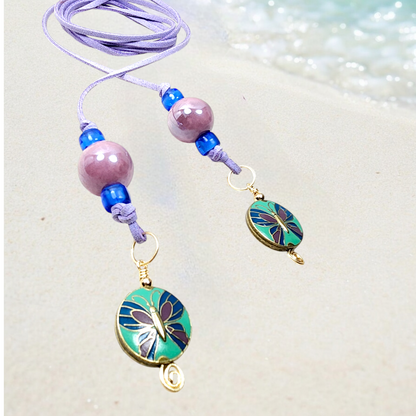 Boho Butterfly Necklace – Handmade Jewelry with Brass Butterfly Beads, Purple Ceramic, Blue Glass & Faux Suede Purple Cord