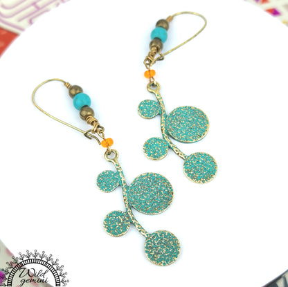 Boho Leaf Earrings – Handmade Brass Dangle Earrings with Turquoise Jasper, Orange Seed Beads & Round Leaf Charms, 3” Long